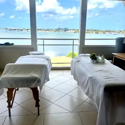 Two massage tables with ocean view